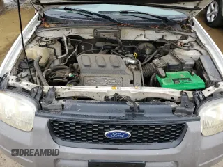 2001 Ford Escape XLS with VIN 1FMYU01191KA29996, listed as a Copart auction lot 86362534 with 265,271 mi miles and Salvage title. Bid and sale history available at DreamBid. Image 12.