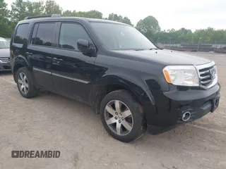 2015 Honda Pilot Touring with VIN 5FNYF4H9XFB036493, listed as a IAAI auction lot 42190624 with 223,675 mi miles and . Bid and sale history available at DreamBid. Image 1.