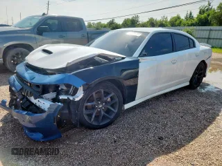2021 Dodge Charger R/T z VIN 2C3CDXCT1MH556968, wystawiony jako Copart lot #57656585 z przebiegiem 48 144 mil mil oraz Czysty tytuł • Clean title. Historia ofert i sprzedaży dostępna na DreamBid. Obrazek 1.