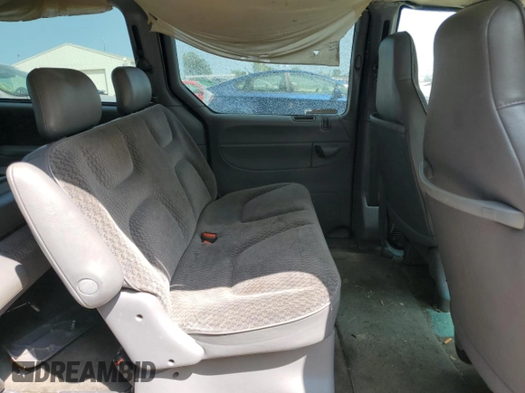 2000 Dodge Caravan z VIN 2B4GP2436YR764492, wystawiony jako Copart lot #68422394 z przebiegiem 236 758 mil mil oraz Czysty tytuł • Clean title. Historia ofert i sprzedaży dostępna na DreamBid. Obrazek 11.