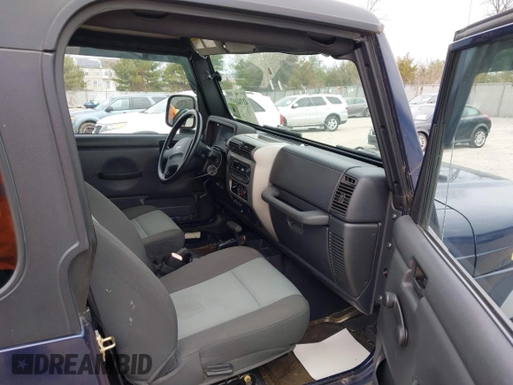 2006 Jeep Wrangler Sport with VIN 1J4FA49S16P737060, listed as a IAAI auction lot 41784197 with 42,030 mi miles. Bid and sale history available at carsss.com. Image 5.
