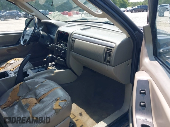 2002 Jeep Grand Cherokee Laredo with VIN 1J8GW48SX2C270339, listed as a IAAI auction lot 42390842 with Not provided miles and . Bid and sale history available at DreamBid. Image 5.