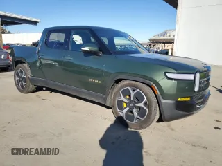 2023 Rivian R1T Adventure with VIN 7FCTGAAA7PN024633, listed as a Copart auction lot 41481365 with 24,965 mi miles and Salvage Title. Bid and sale history available at carsss.com. Image 4.