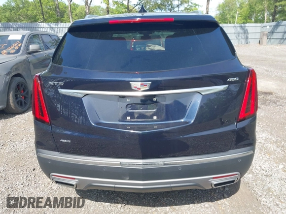 2021 Cadillac XT5 AWD Premium Luxury z VIN 1GYKNDRS8MZ217572, wystawiony jako IAAI lot #42190571 z przebiegiem 25 100 mil mil oraz . Historia ofert i sprzedaży dostępna na DreamBid. Obrazek 16.