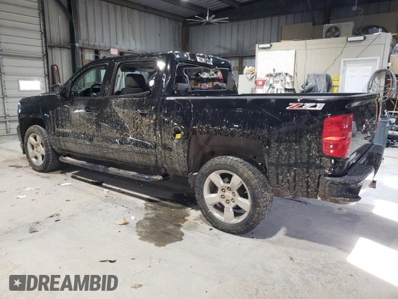2016 Chevrolet Silverado 1500 LT with VIN 3GCUKREC3GG148667, listed as a Copart auction lot 49725285 with 40,330 mi miles and Salvage Title. Bid and sale history available at DreamBid. Image 2.
