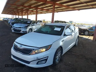 2014 Kia Optima EX z VIN 5XXGN4A74EG294124, wystawiony jako IAAI lot #41413272 z przebiegiem 154 058 mil mil oraz . Historia ofert i sprzedaży dostępna na DreamBid. Obrazek 2.