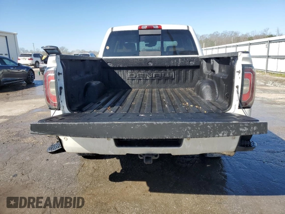 2017 GMC Sierra 1500 Denali with VIN 3GTU2PEJ3HG128374, listed as a Copart auction lot 47121155 with 214,373 mi miles and Salvage Title. Bid and sale history available at DreamBid. Image 6.