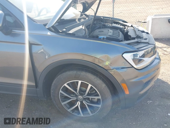 2021 Volkswagen Tiguan S with VIN 3VV0B7AX3MM038342, listed as a IAAI auction lot 42545665 with 66,809 mi miles and . Bid and sale history available at DreamBid. Image 18.