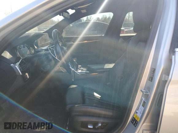 2018 BMW 5 Series 530i xDrive with VIN WBAJA7C51JWA74673, listed as a Copart auction lot 49479335 with 98,312 mi miles and Salvage Title. Bid and sale history available at carsss.com. Image 7.