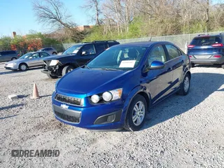 2014 Chevrolet Sonic LT with VIN 1G1JC5SH6E4164809, listed as a IAAI auction lot 42006407 with 105,710 mi miles and . Bid and sale history available at DreamBid. Image 2.