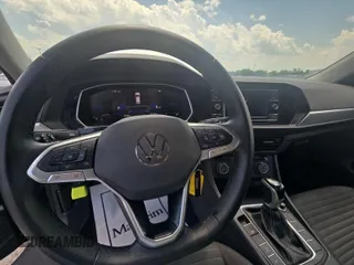 2024 Volkswagen Jetta S with VIN 3VW5M7BU6RM050864, listed as a IAAI auction lot 42854244 with 23,681 mi miles and . Bid and sale history available at DreamBid. Image 4.