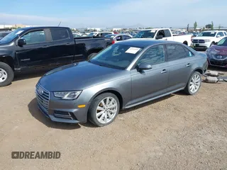 2018 Audi A4 Premium z VIN WAUDNAF47JN017558, wystawiony jako IAAI lot #42233399 z przebiegiem 107 982 mil mil oraz . Historia ofert i sprzedaży dostępna na DreamBid. Obrazek 2.