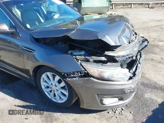 2014 Kia Optima EX z VIN 5XXGN4A78EG320367, wystawiony jako IAAI lot #41858824 z przebiegiem 216 987 mil mil oraz . Historia ofert i sprzedaży dostępna na DreamBid. Obrazek 17.