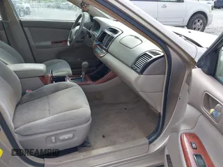 2004 Toyota Camry LE with VIN 4T1BF30K24U570599, listed as a IAAI auction lot 42107715 with 324,191 mi miles and . Bid and sale history available at DreamBid. Image 5.