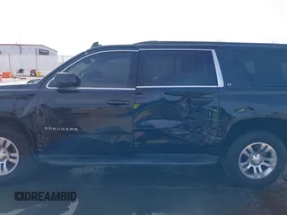 2018 Chevrolet Suburban LT with VIN 1GNSCHKC3JR237396, listed as a IAAI auction lot 41774171 with 205,970 mi miles and . Bid and sale history available at DreamBid. Image 14.