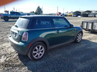 2008 MINI Hardtop with VIN WMWMF33518TT64881, listed as a IAAI auction lot 41692875 with 152,380 mi miles and . Bid and sale history available at DreamBid. Image 4.