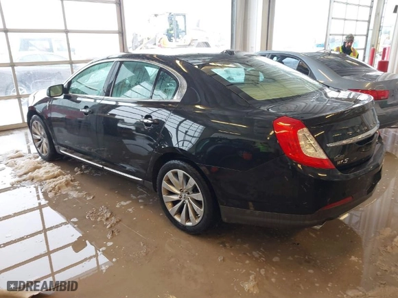2015 Lincoln MKS with VIN 1LNHL9DK9FG604085, listed as a IAAI auction lot 41251811 with 58502 miles. Bid and sale history available at carsss.com. Image 3.