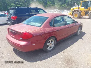 2002 Ford Taurus SE Standard with VIN 1FAFP53U92A123610, listed as a IAAI auction lot 42108874 with 157,323 mi miles and . Bid and sale history available at DreamBid. Image 4.