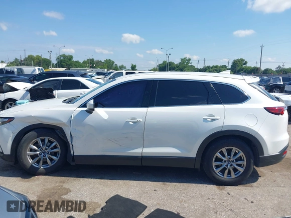 2019 Mazda CX-9 Touring with VIN JM3TCACY7K0314539, listed as a IAAI auction lot 42234361 with 98,299 mi miles and . Bid and sale history available at DreamBid. Image 14.