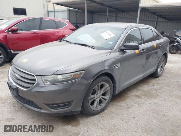 2015 Ford Taurus SEL z VIN 1FAHP2E85FG209085, wystawiony jako IAAI lot #41944532 z przebiegiem 143 850 mil mil oraz . Historia ofert i sprzedaży dostępna na DreamBid. Obrazek 2.