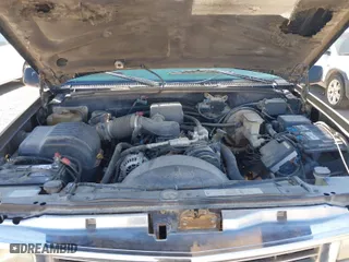 1997 Chevrolet Tahoe with VIN 3GNEK18RXVG147235, listed as a IAAI auction lot 41881750 with 184,629 mi miles. Bid and sale history available at carsss.com. Image 10.