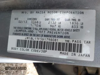 2013 Mazda 3 i SV with VIN JM1BL1TF5D1798081, listed as a IAAI auction lot 42091117 with 137,669 mi miles. Bid and sale history available at carsss.com. Image 9.