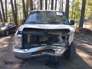2013 Ford Econoline Cargo Commercial with VIN 1FTNE2EW7DDA15769, listed as a IAAI auction lot 41989021 with 179,557 mi miles and . Bid and sale history available at DreamBid. Image 6.