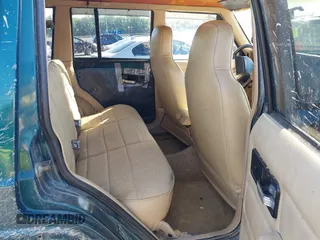 1995 Jeep Cherokee Sport z VIN 1J4FJ68S7SL623451, wystawiony jako IAAI lot #42581407 z przebiegiem 160 581 mil mil oraz . Historia ofert i sprzedaży dostępna na DreamBid. Obrazek 8.