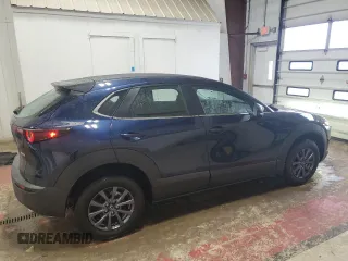 2024 Mazda CX-30 S with VIN 3MVDMBAM1RM694015, listed as a Copart auction lot 46675695 with 4,909 mi miles and Salvage Title. Bid and sale history available at DreamBid. Image 3.