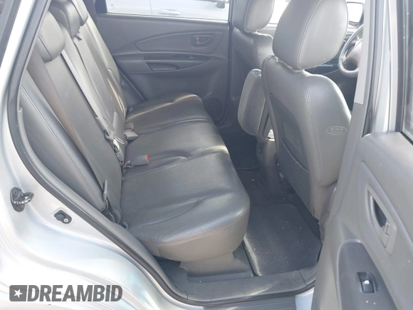 2007 Hyundai Tucson SE with VIN KM8JN72DX7U492369, listed as a IAAI auction lot 41665512 with 228,660 mi miles and . Bid and sale history available at DreamBid. Image 8.