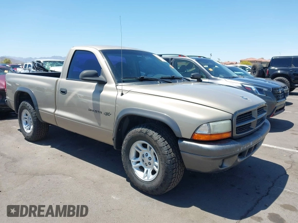 2002 Dodge Dakota with VIN 1B7FL16X72S642881, listed as a IAAI auction lot 42153560 with 220,917 mi miles and . Bid and sale history available at carsss.com. Image 1.