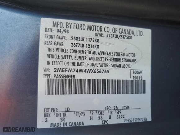 1998 Mercury Grand Marquis GS with VIN 2MEFM74W4WX656765, listed as a Copart auction lot 72720054 with 147,038 mi miles and Salvage Title. Bid and sale history available at carsss.com. Image 14.