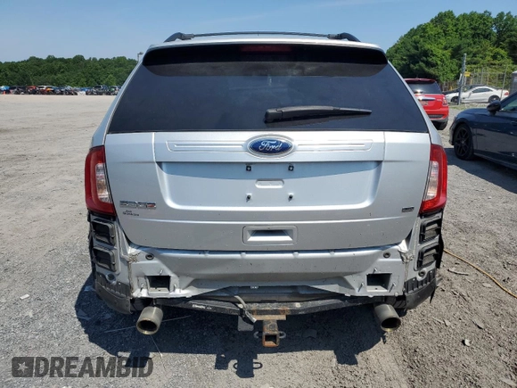 2014 Ford Edge SE z VIN 2FMDK4GC3EBB06138, wystawiony jako Copart lot #60747405 z przebiegiem 135 620 mil mil oraz Szkoda całkowita • Salvage title. Historia ofert i sprzedaży dostępna na DreamBid. Obrazek 6.