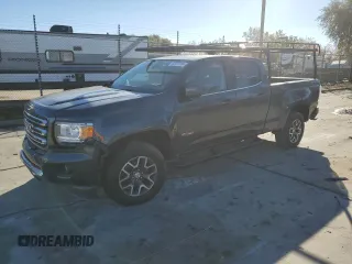 2015 GMC Canyon 2WD SLE with VIN 1GTG5BE38F1240947, listed as a Copart auction lot 82707204 with 63,049 mi miles and Salvage Title. Bid and sale history available at carsss.com. Image 1.