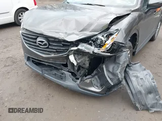 2016 Mazda CX-5 Sport with VIN JM3KE4BY8G0895209, listed as a IAAI auction lot 41688405 with 115,954 mi miles. Bid and sale history available at carsss.com. Image 6.