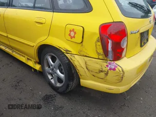 2002 Mazda Protege z VIN JM1BJ245821533704, wystawiony jako IAAI lot #42451904 z przebiegiem 170 864 mil mil oraz . Historia ofert i sprzedaży dostępna na DreamBid. Obrazek 6.