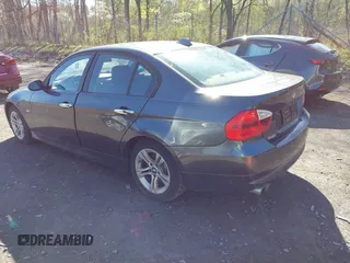 2008 BMW 3 Series 328xi with VIN WBAVC93518K043073, listed as a IAAI auction lot 42134507 with 148,712 mi miles. Bid and sale history available at carsss.com. Image 3.