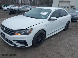 2017 Volkswagen Passat R-Line w/Comfort Pkg with VIN 1VWDT7A32HC016590, listed as a IAAI auction lot 41855085 with 166,089 mi miles. Bid and sale history available at carsss.com. Image 2.