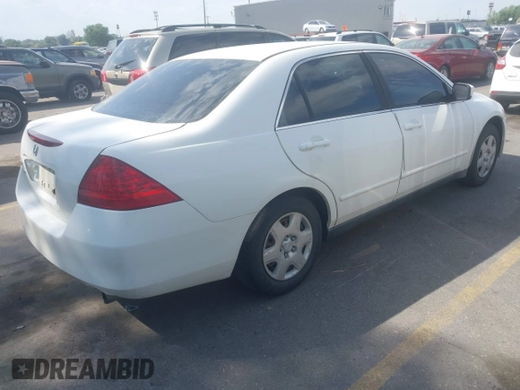 2007 Honda Accord LX with VIN 1HGCM56457A039536, listed as a IAAI auction lot 42640467 with 303,475 mi miles and . Bid and sale history available at DreamBid. Image 4.