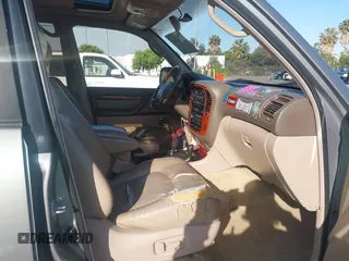 2001 Lexus LX 470 z VIN JTJHT00W113500583, wystawiony jako IAAI lot #42373922 z przebiegiem 269 323 mil mil oraz . Historia ofert i sprzedaży dostępna na DreamBid. Obrazek 5.