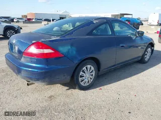 2003 Honda Accord Cpe LX with VIN 1HGCM72243A033561, listed as a IAAI auction lot 41721175 with 285,429 mi miles. Bid and sale history available at carsss.com. Image 4.