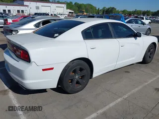 2013 Dodge Charger SE z VIN 2C3CDXBG1DH507807, wystawiony jako IAAI lot #41930944 z przebiegiem 192 425 mil mil oraz . Historia ofert i sprzedaży dostępna na DreamBid. Obrazek 4.