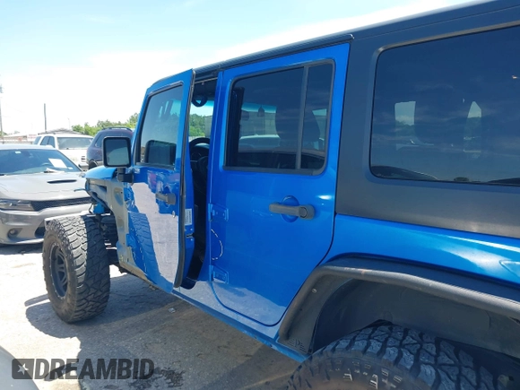 2016 Jeep Wrangler Unlimited Sport with VIN 1C4BJWDG2GL296485, listed as a IAAI auction lot 42177026 with 113,971 mi miles and . Bid and sale history available at DreamBid. Image 14.