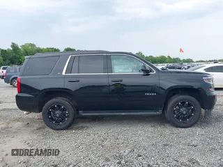 2017 Chevrolet Tahoe LT z VIN 1GNSCBKC1HR326973, wystawiony jako IAAI lot #42212769 z przebiegiem 128 074 mil mil oraz . Historia ofert i sprzedaży dostępna na DreamBid. Obrazek 13.