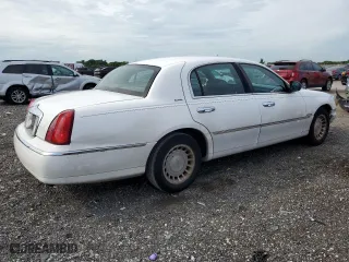 2002 Lincoln Town Car Executive with VIN 1LNHM81W82Y609104, listed as a Copart auction lot 75442374 with 324,612 mi miles and Salvage Title. Bid and sale history available at carsss.com. Image 3.