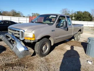 1999 Ford Super Duty F-250 XL with VIN 1FTNX20F9XEE66766, listed as a Copart auction lot 46595795 with 571,503 mi miles and Salvage Title. Bid and sale history available at carsss.com. Image 1.