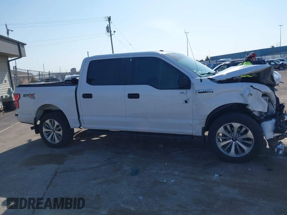 2018 Ford F-150 XL with VIN 1FTEW1EP9JKF26133, listed as a IAAI auction lot 42062779 with 119,518 mi miles. Bid and sale history available at carsss.com. Image 13.