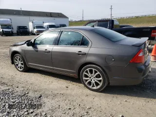 2012 Ford Fusion SE with VIN 3FAHP0HA4CR275893, listed as a Copart auction lot 52882725 with 192,725 mi miles and Salvage Title. Bid and sale history available at DreamBid. Image 2.