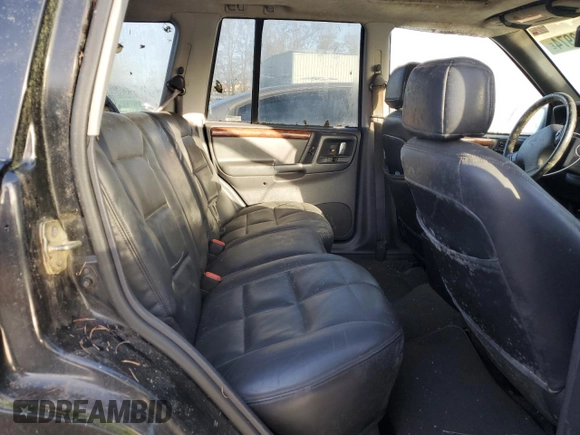 1998 Jeep Grand Cherokee Limited with VIN 1J4GZ78S0WC138917, listed as a Copart auction lot 86223974 with 152,482 mi miles and Clean title. Bid and sale history available at DreamBid. Image 10.