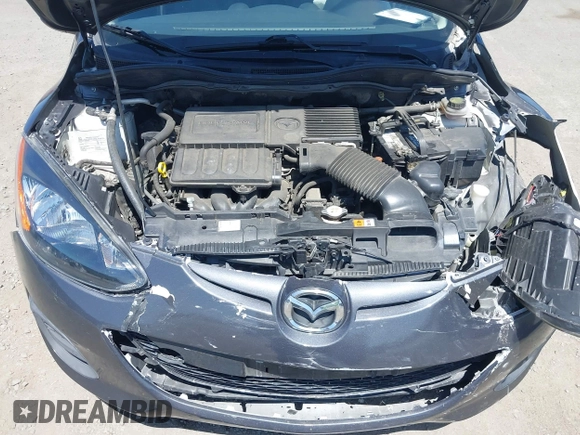 2014 Mazda 2 Sport z VIN JM1DE1KY8E0172828, wystawiony jako IAAI lot #42374758 z przebiegiem 120 180 mil mil oraz . Historia ofert i sprzedaży dostępna na DreamBid. Obrazek 10.